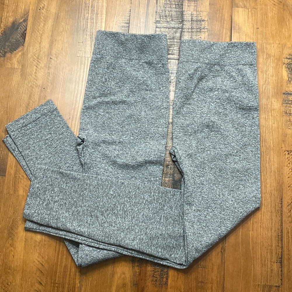 Two pairs of marbled leggings.
